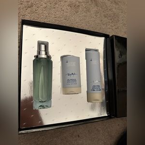 Angel innocent perfume, shower gel, and body milk